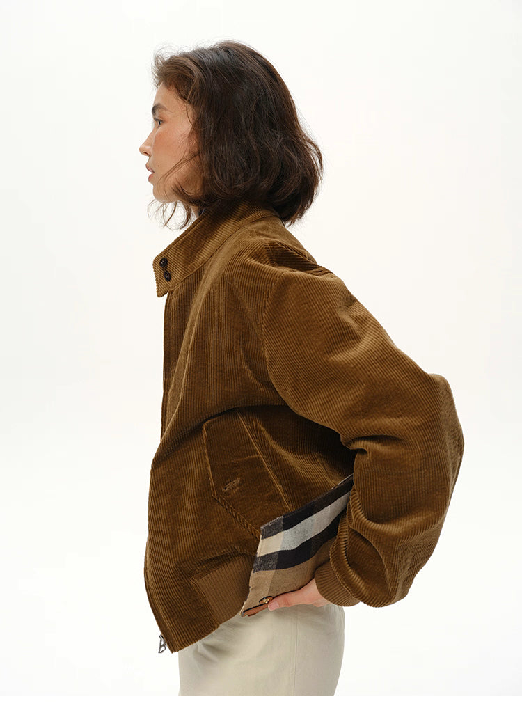 side profile of coffee brown corduroy jacket showing pocket detail