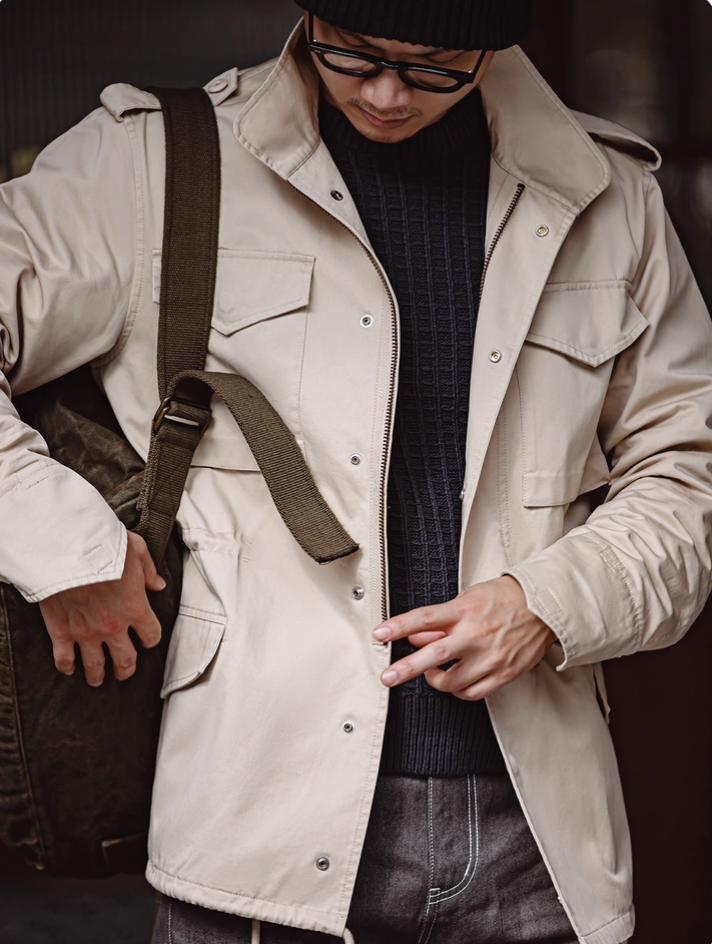 Model wearing Heritage M65 Field Jacket with shoulder bag for urban styling