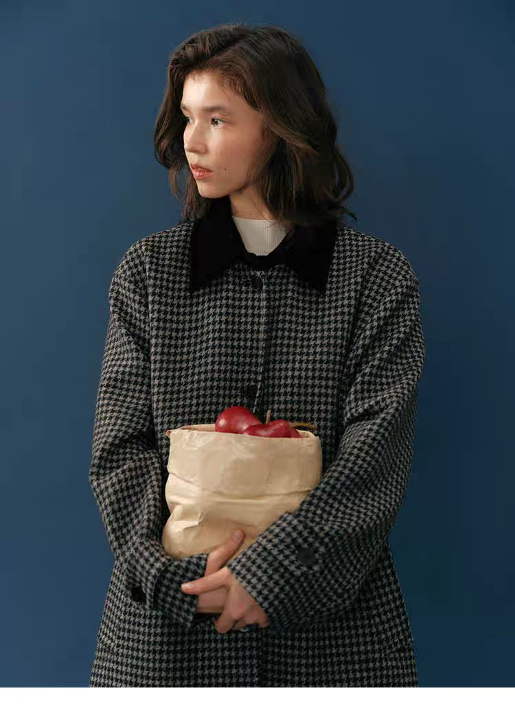 Upper-body view highlighting the soft corduroy collar and black-grey houndstooth wool.