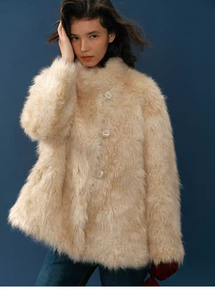 Front portrait of model in Almond Aura Plush Coat with three-button closure