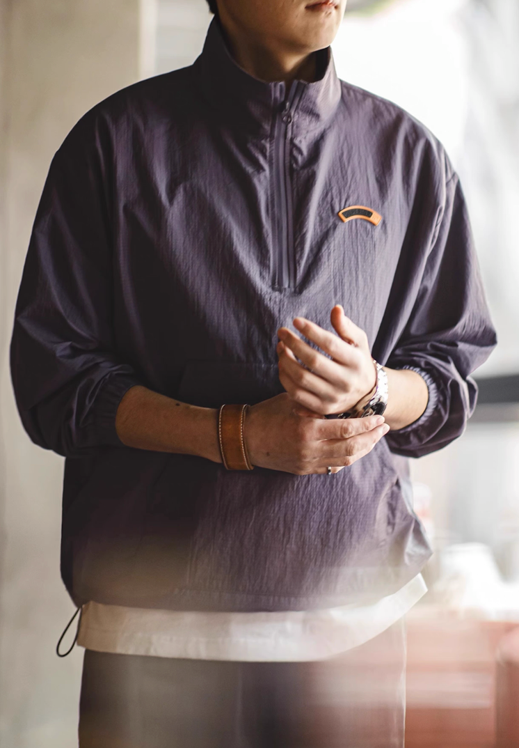 Casual indoor outfit featuring dusty purple lightweight half zip anorak jacket