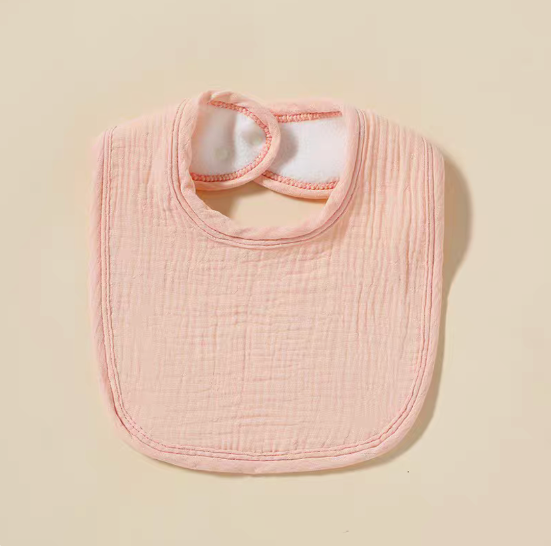 Light Pink baby cotton gauze bib with soft texture and adjustable snap closure
