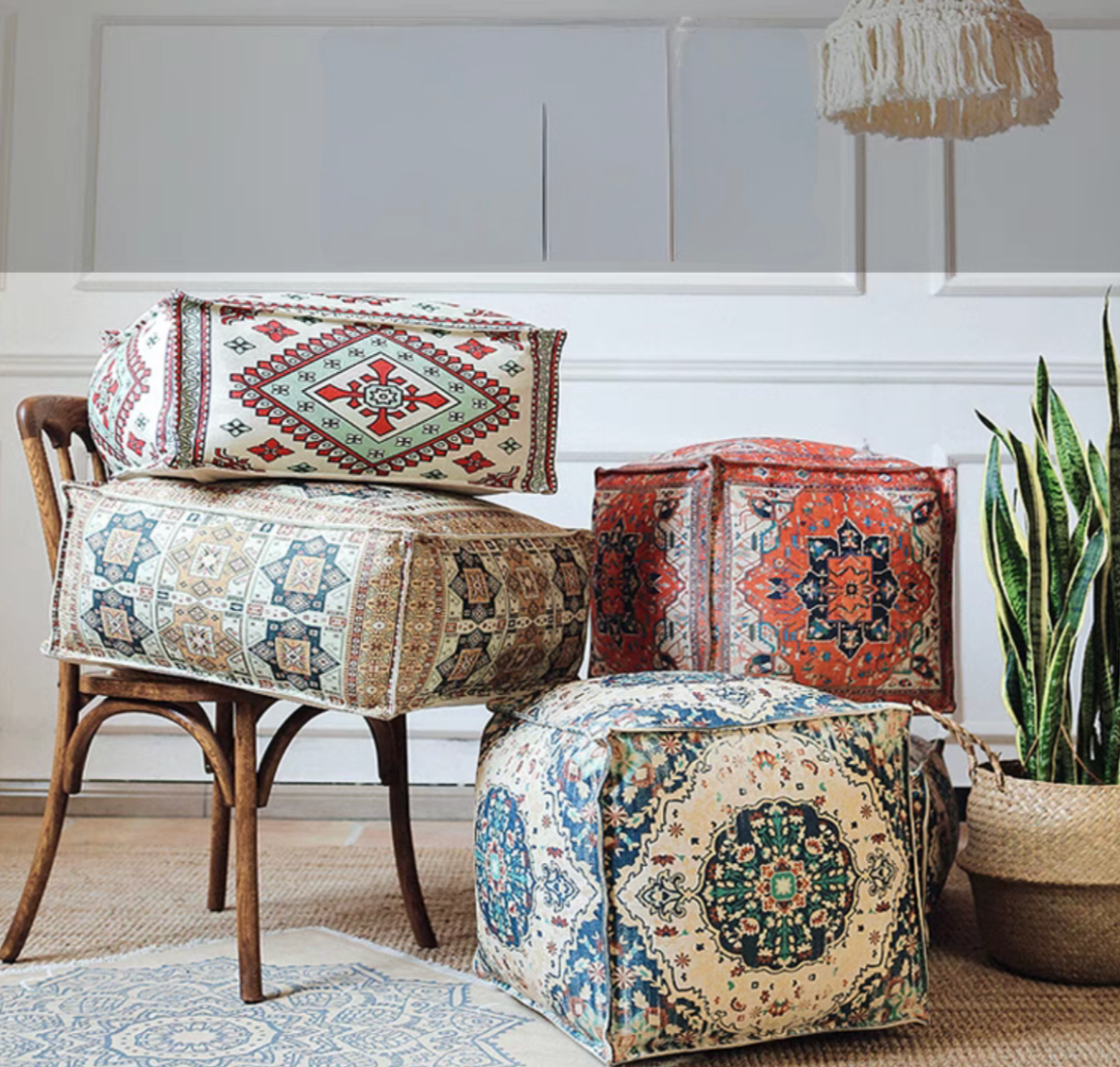 Bohemian patterned square floor pouf cushion in multiple colors displayed together in a living room