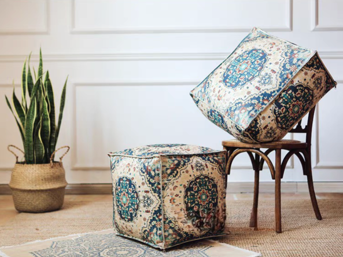 Vinnie Yellow bohemian patterned square floor pouf cushion displayed on and beside a wooden chair