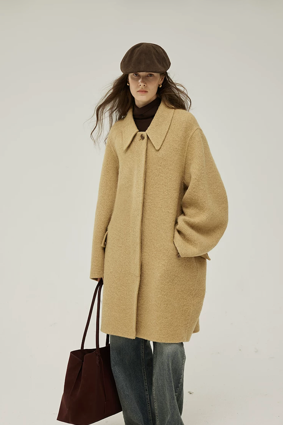Camel knee-length cocoon wool coat with oversized point collar and buttoned flap pocket