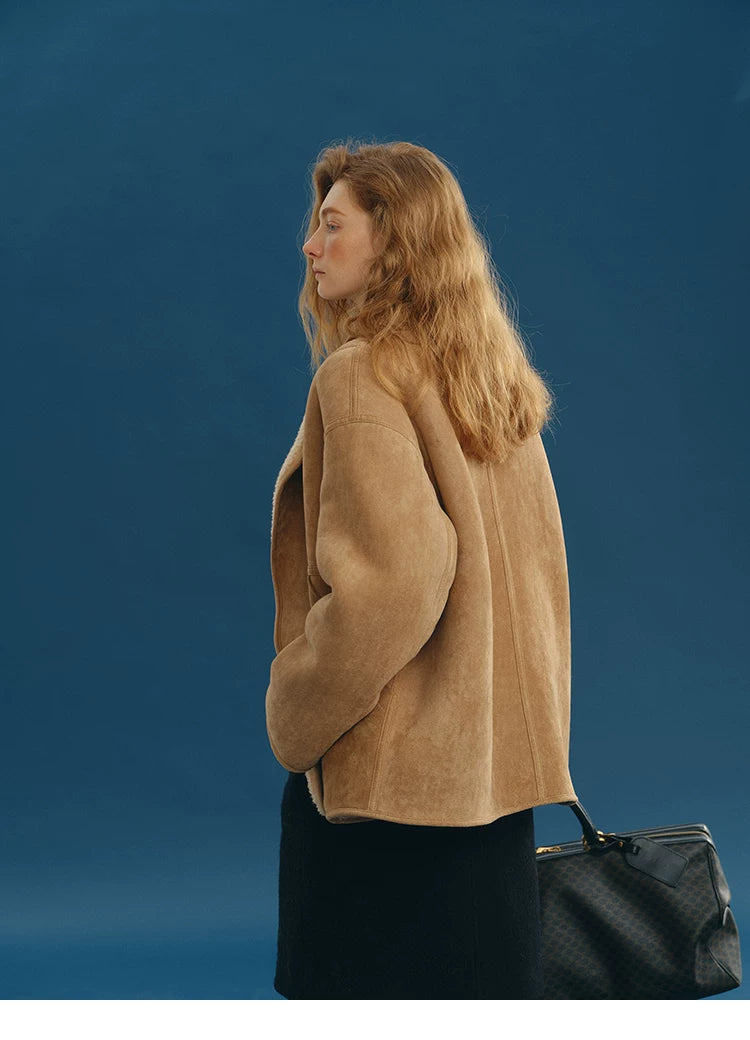 Side-back view of a Camel faux-suede jacket showing dropped shoulders and rounded hem