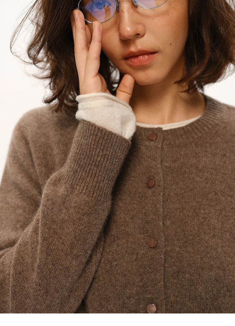 Close-up of coffee brown yak-cashmere cardigan cuff and button details