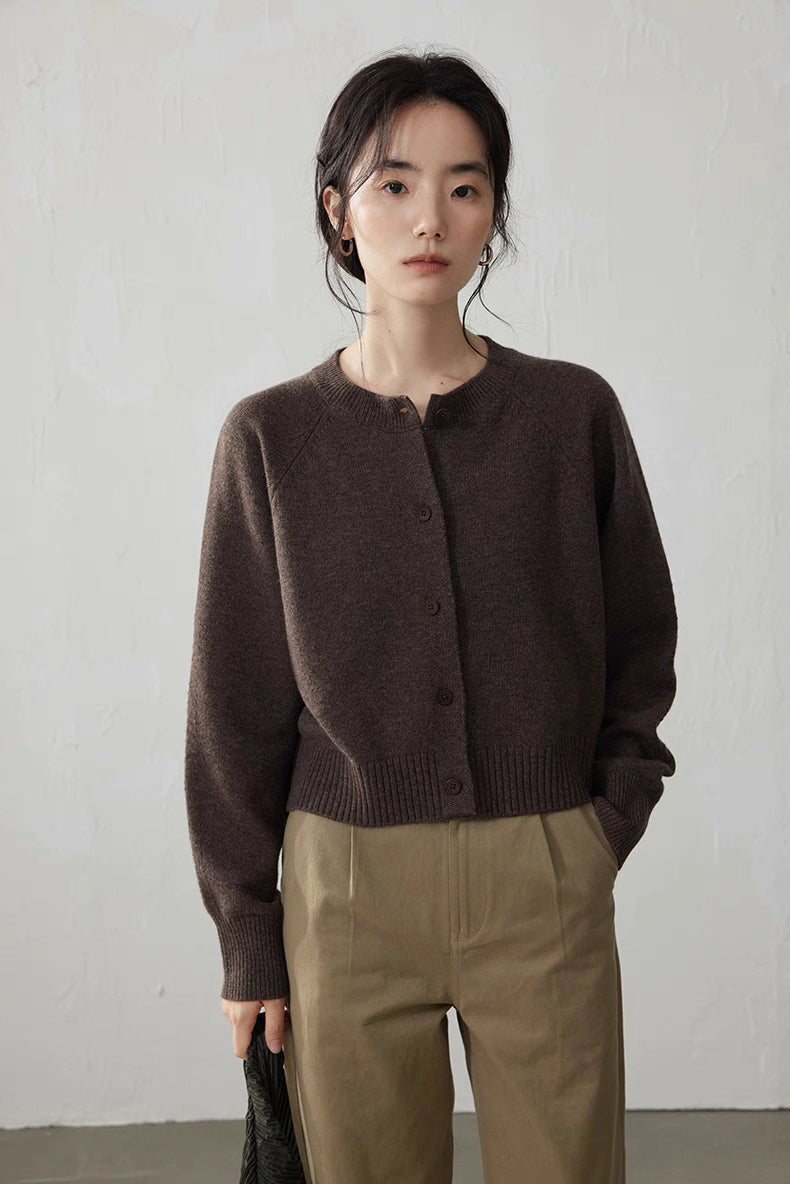 Dark Coffee Brown Merino wool cropped cardigan close-up on model