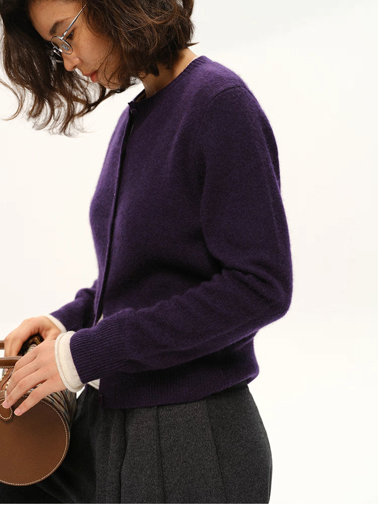 Side profile of deep purple yak-cashmere cardigan highlighting sleeve texture