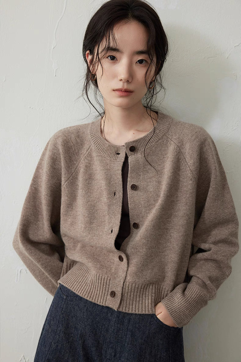 Light Brown Merino wool cropped cardigan close-up with nut buttons