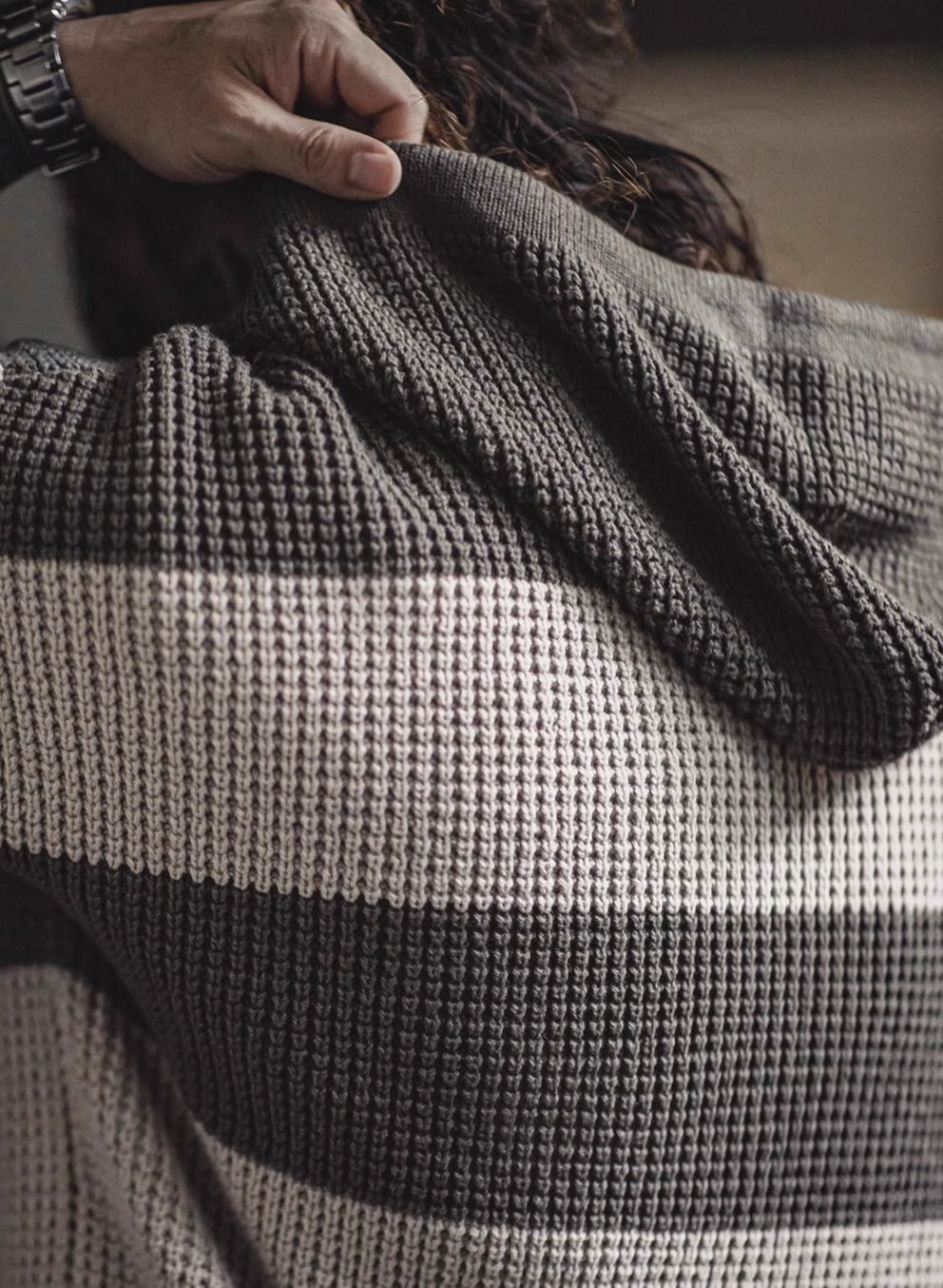 Back detail of Casual Striped Waffle-Knit Pullover Hoodie Lead Gray Stripes highlighting waffle knit texture two-tone stripes and cozy long sleeve design