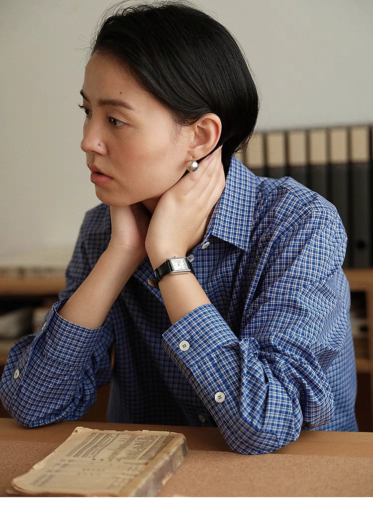 Checkered Ease Shirt blue plaid close up showing classic collar cotton fabric texture and checkered pattern detail