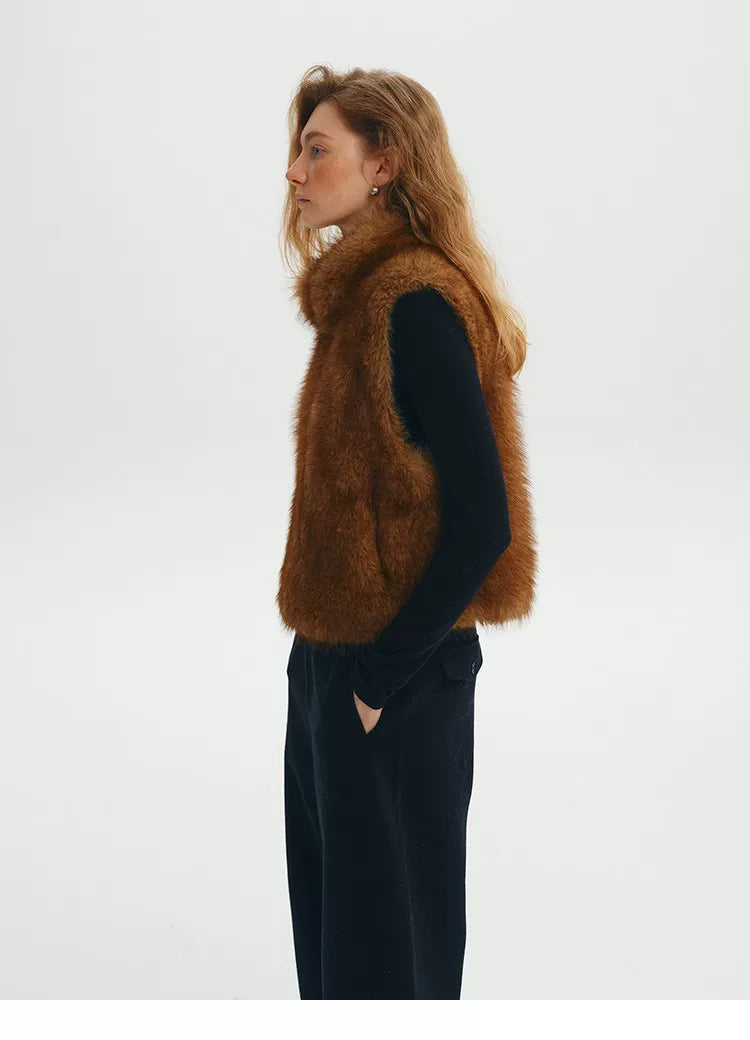 Side profile of a Chestnut faux fur vest showing the cropped length and plush pile