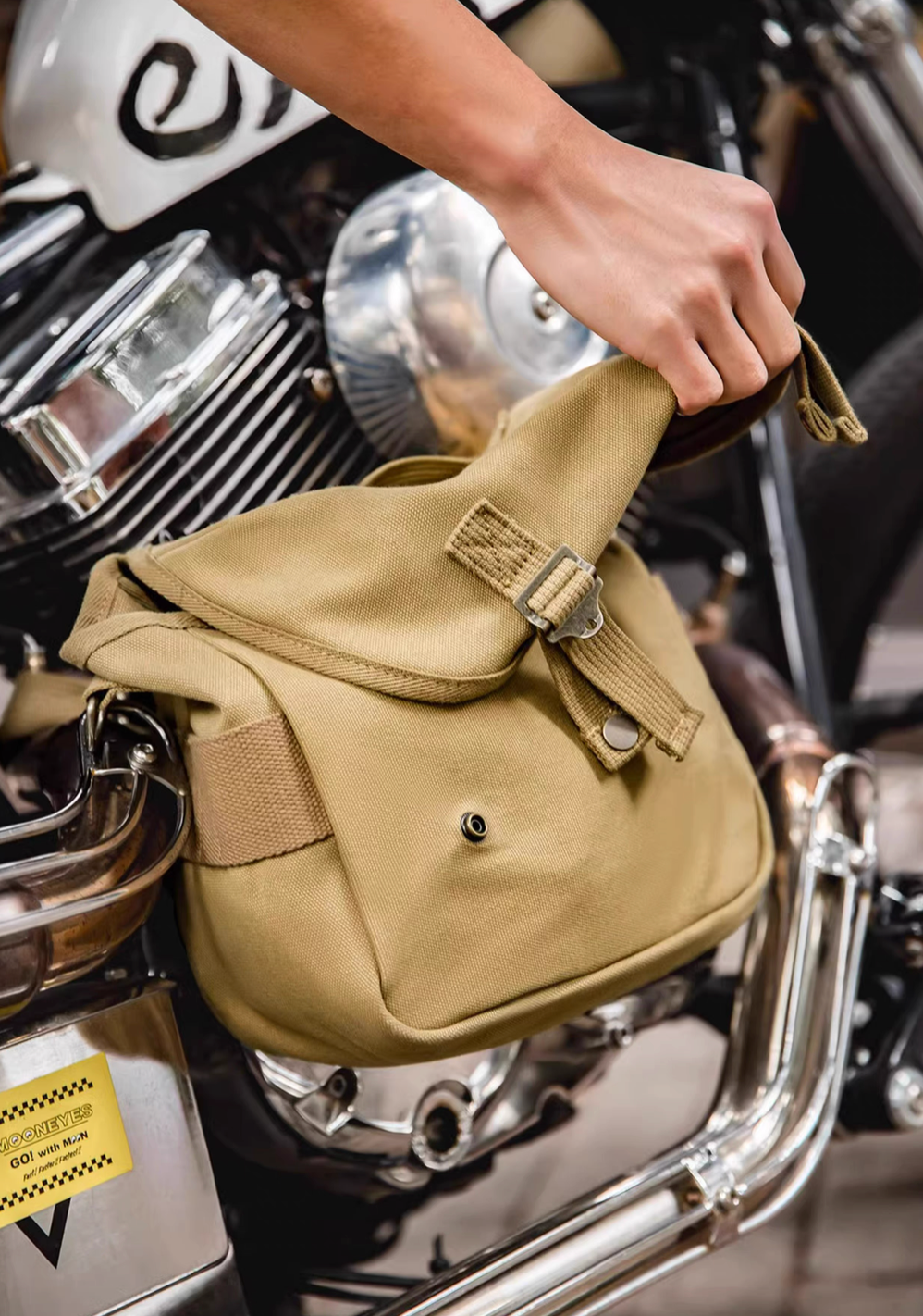 Khaki Classic M1961 canvas motorcycle bag placed on motorcycle highlighting vintage biker style and durable canvas material