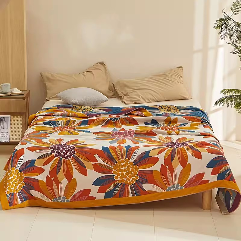 Colorful Super Soft Long-staple Cotton Blanket Sunflower with large colorful floral pattern displayed on bedroom bed