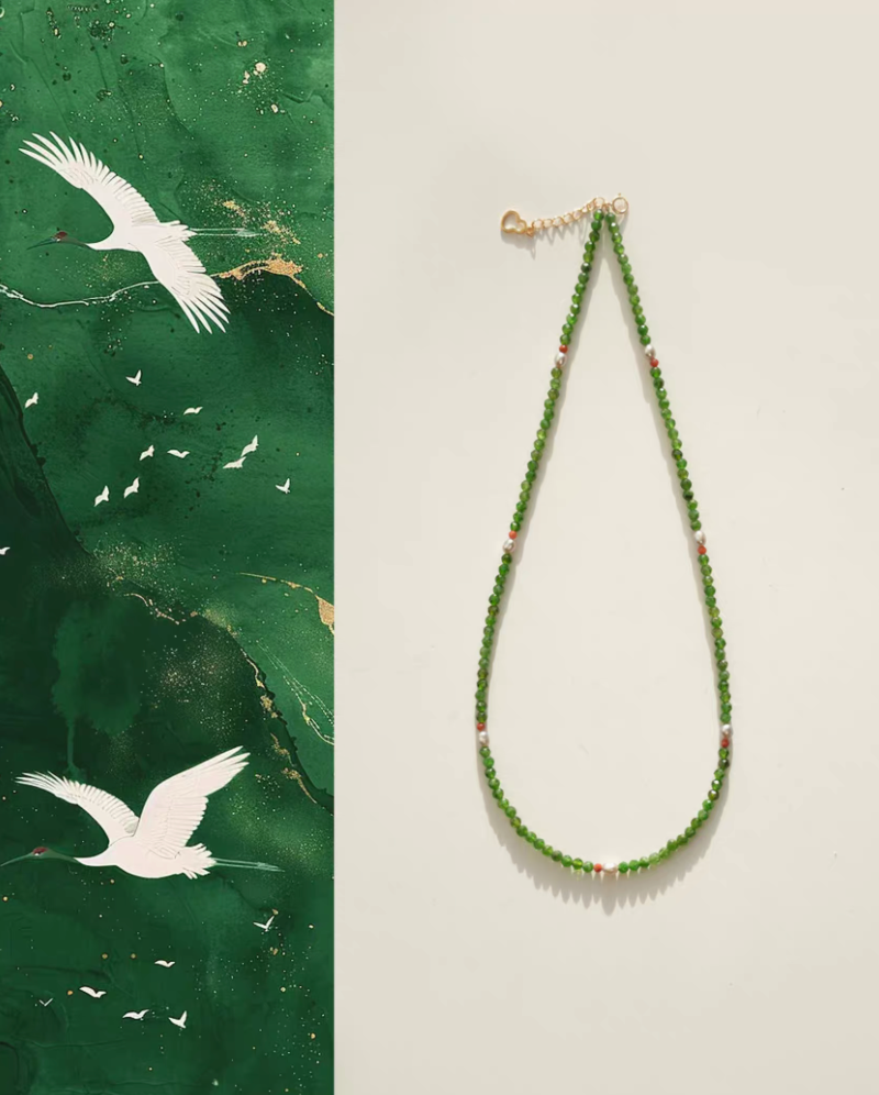 Emerald green gemstone and pearl necklace with diopside beads, red agate accents, and freshwater pearl full product view