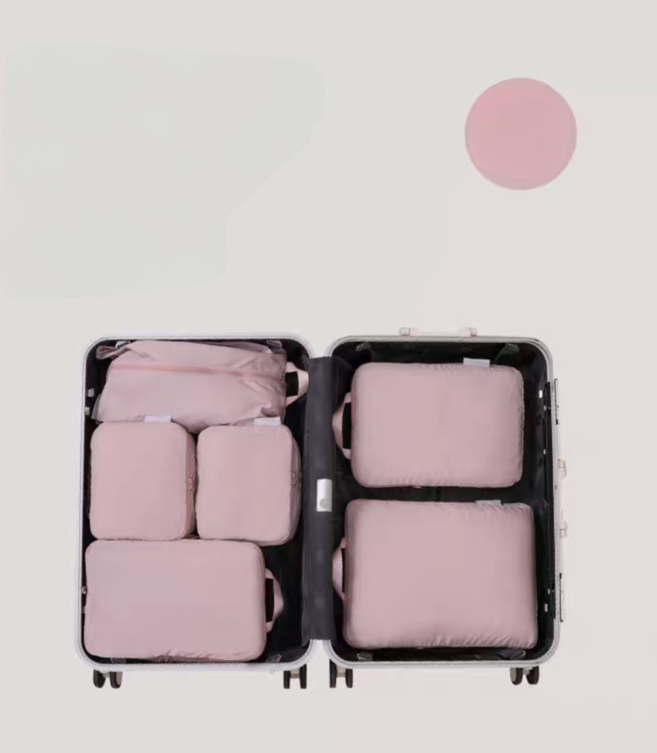 Bean Pink Compression Travel Packing Cubes with Shoe and Clothing Organizer Set showing the 7pcs suitcase layout