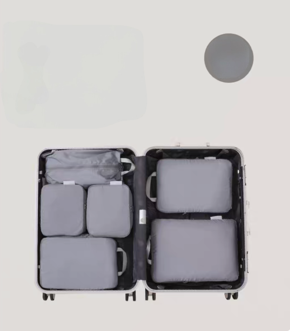 Ultimate Gray Compression Travel Packing Cubes with Shoe and Clothing Organizer Set showing the 7pcs suitcase layout