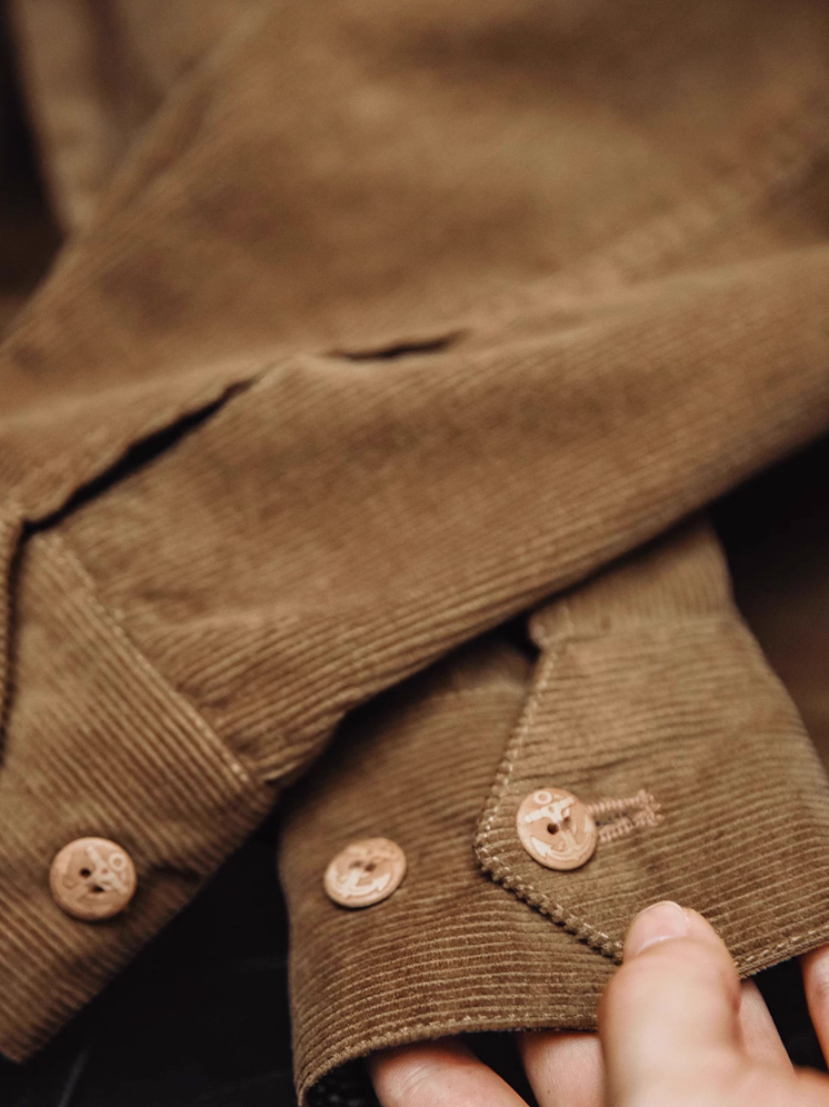 Double button cuff detail on corduroy Harrington jacket sleeve