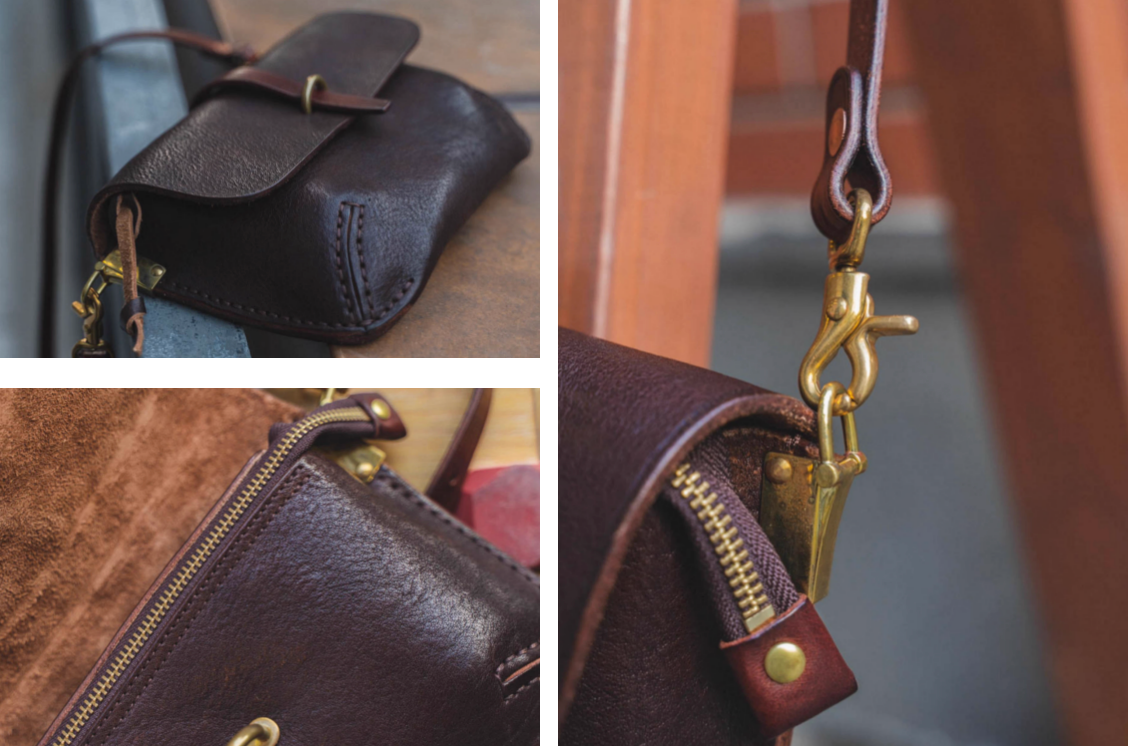 Close-up of brass buckle, zipper, and stitching details on Italian leather crossbody bag