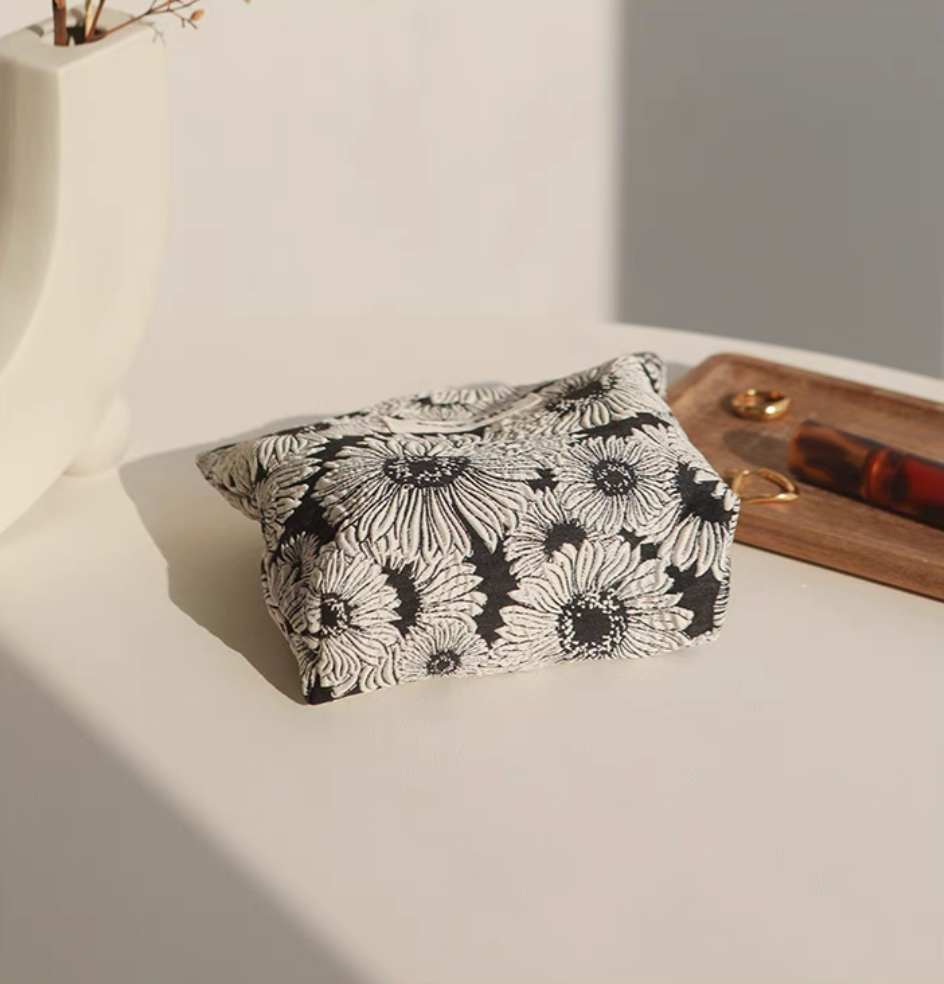 Daisy Daisy Travel Makeup Bag side view showing boxy structure and capacity design