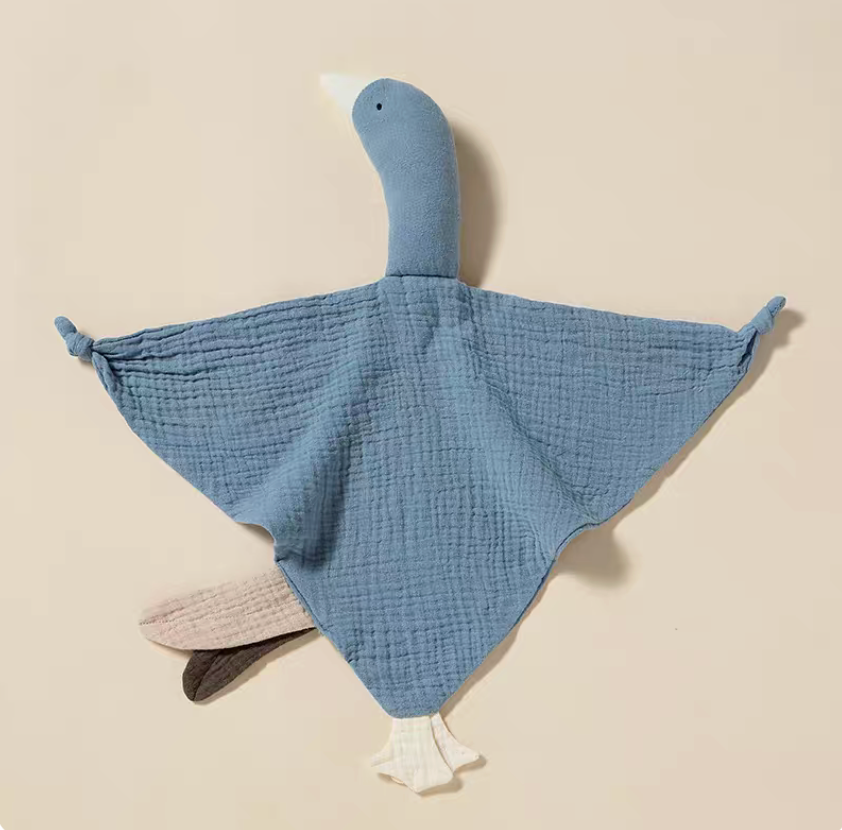 Soft blue duck lovey teething toy opened flat highlighting breathable cotton weave and gentle texture