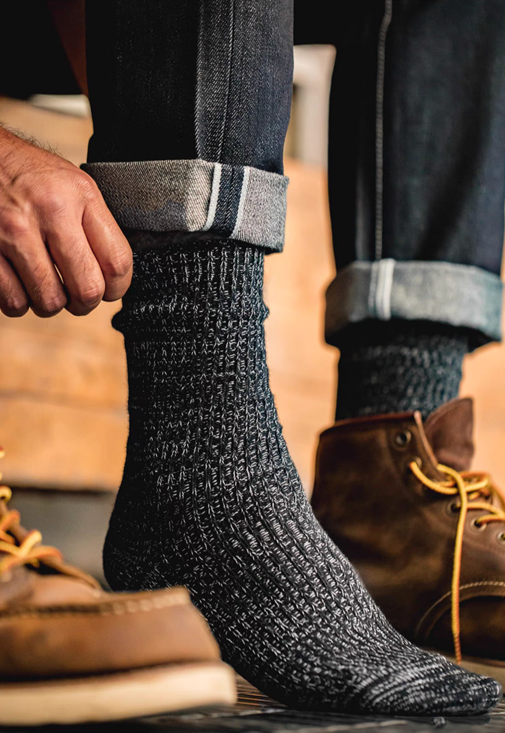 Durable Cotton Crew Socks in black worn with boots featuring breathable ribbed knit texture for daily comfort and durability