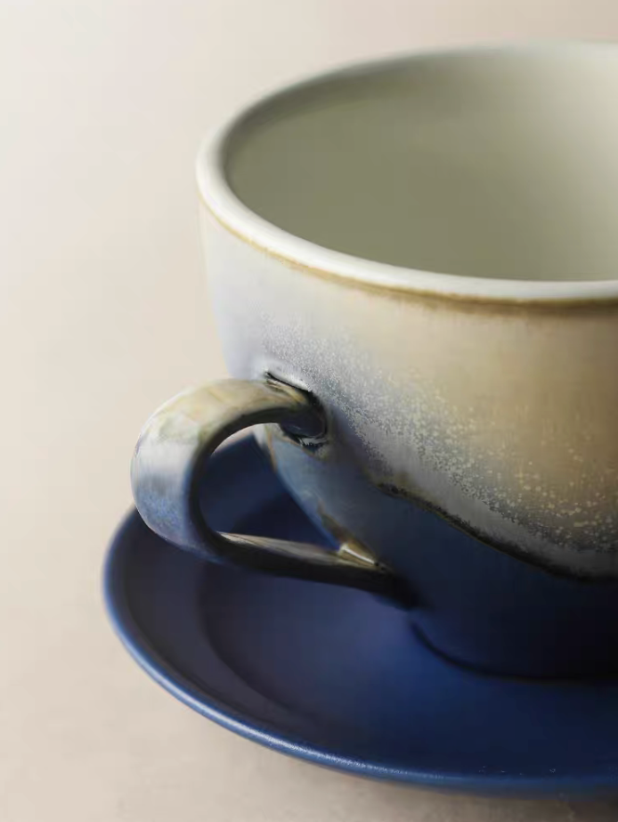 Kiln-Change Blue ceramic coffee cup close-up of handle and glaze texture showing handcrafted finish details