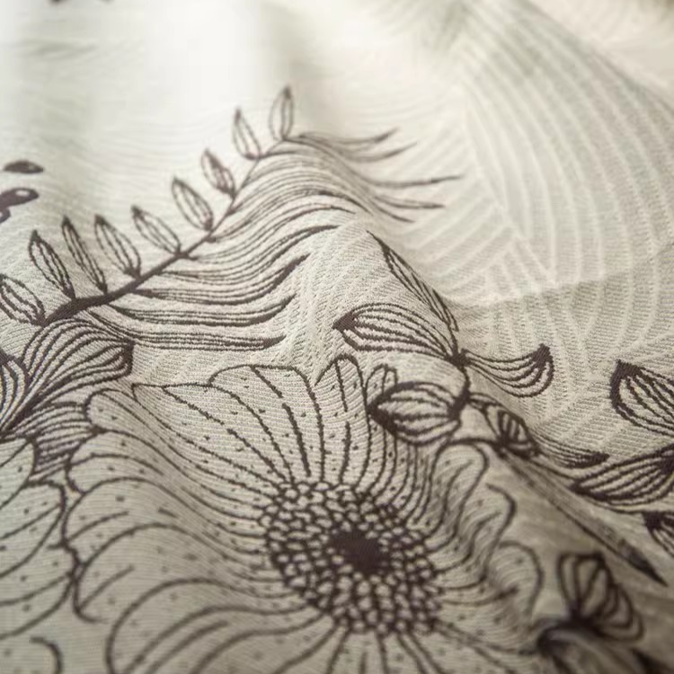Close-up of Floral Cotton Gauze Blanket Elegant Splendor showing delicate botanical flower pattern on cotton gauze fabric