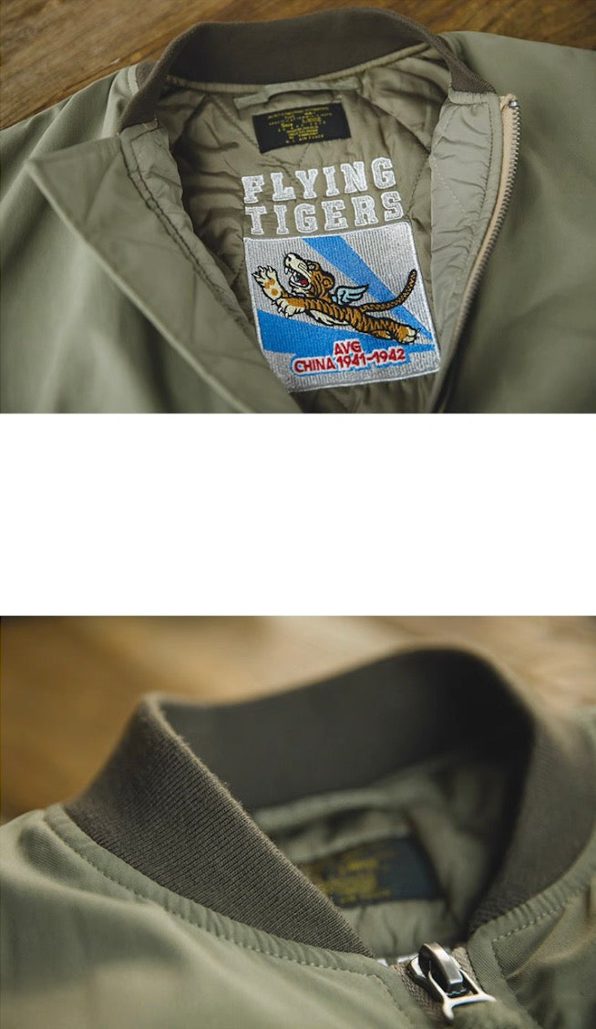 Flying Tigers embroidered inner patch and ribbed collar detail on army green MA-1.