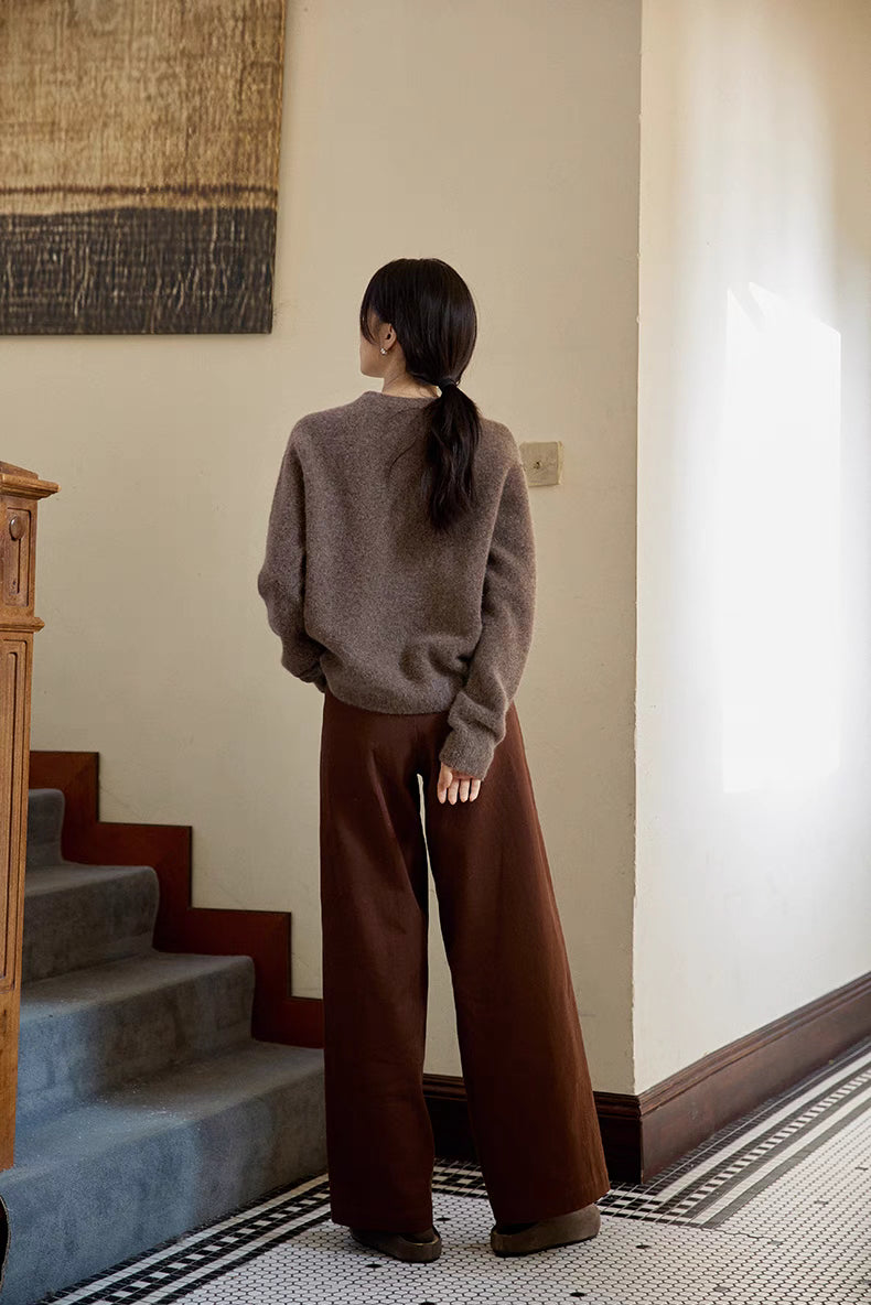 Back view of coffee brown brushed wool sweater highlighting relaxed oversized fit and soft texture