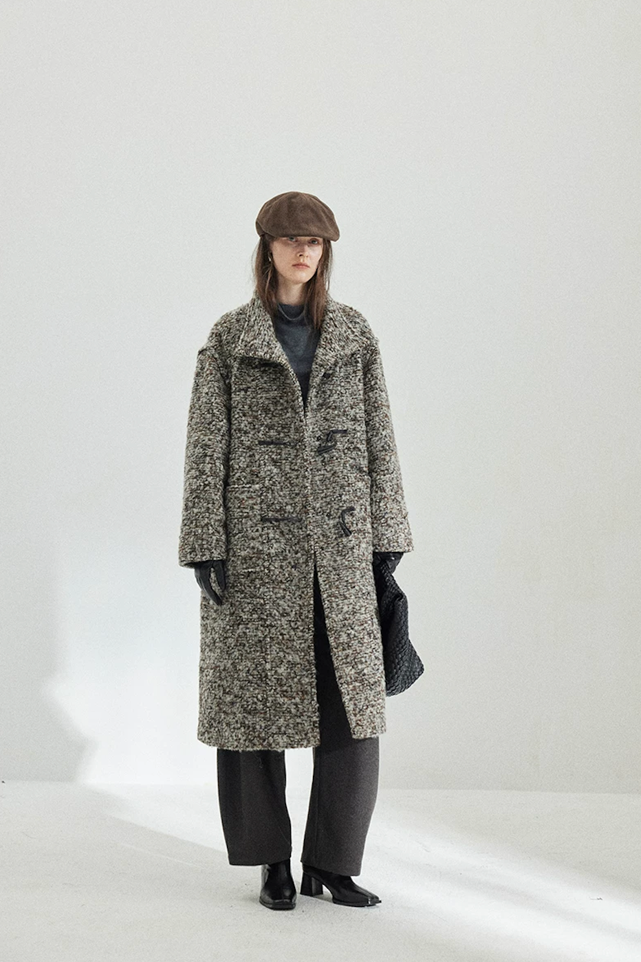 Full-length front view of a Gray Marl straight-cut bouclé coat falling below the knee