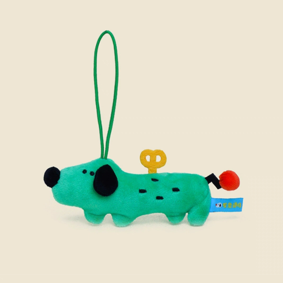 Green handmade plush puppy charm keychain front view with playful design and soft fabric texture