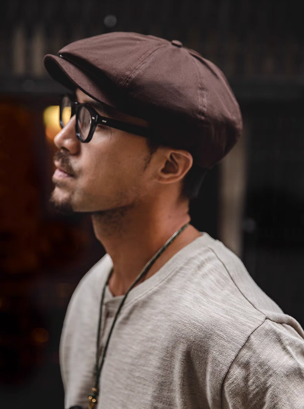 Side profile of Hudson Cotton Blend Newsboy Cap coffee red highlighting tailored fit structured panels and smooth cotton blend fabric for everyday wear