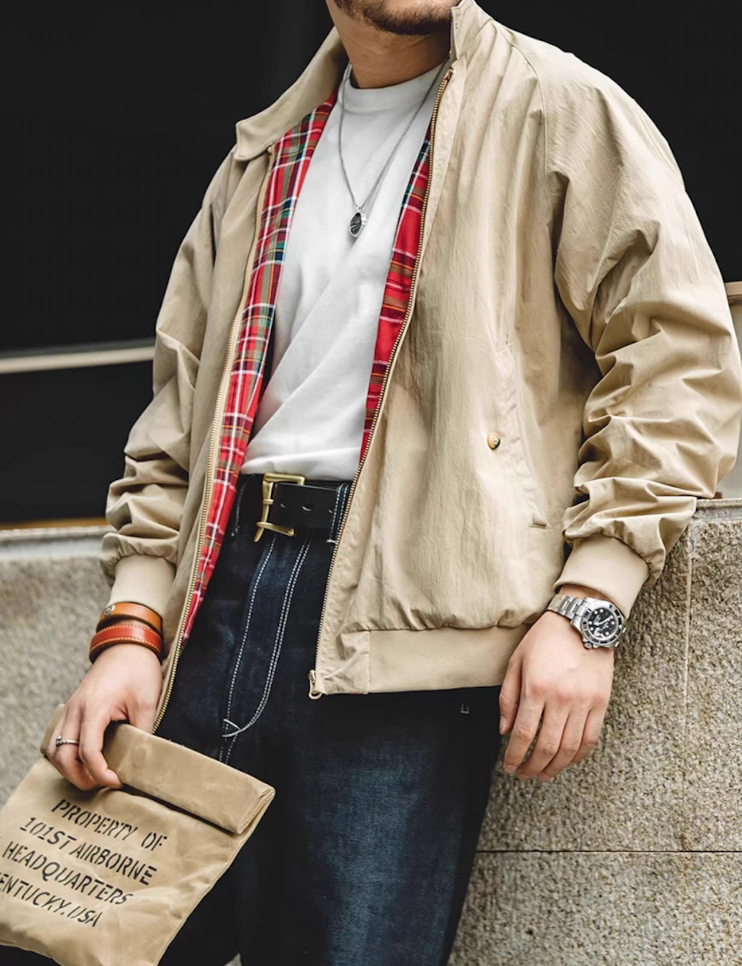 Harrington jacket styled with white T-shirt, jeans, and Fraser tartan lining