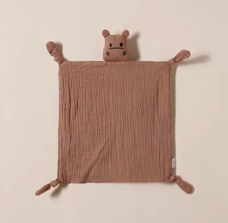 Coffee muslin baby comfort cloth with plush animal head and knotted corners displayed flat