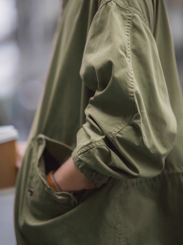 Side view showing pocket and sleeve of M-65 fishtail parka