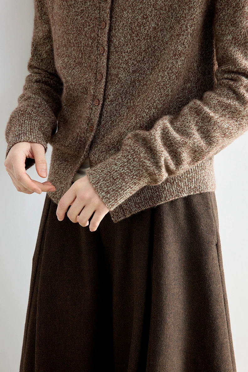 Close-up of heather brown wool cardigan cuff and hem detail