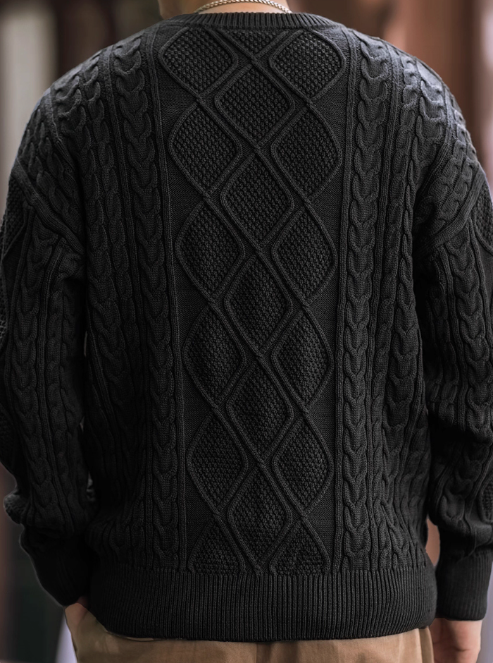 Men’s black diamond cable knit sweater, back view with full pattern.