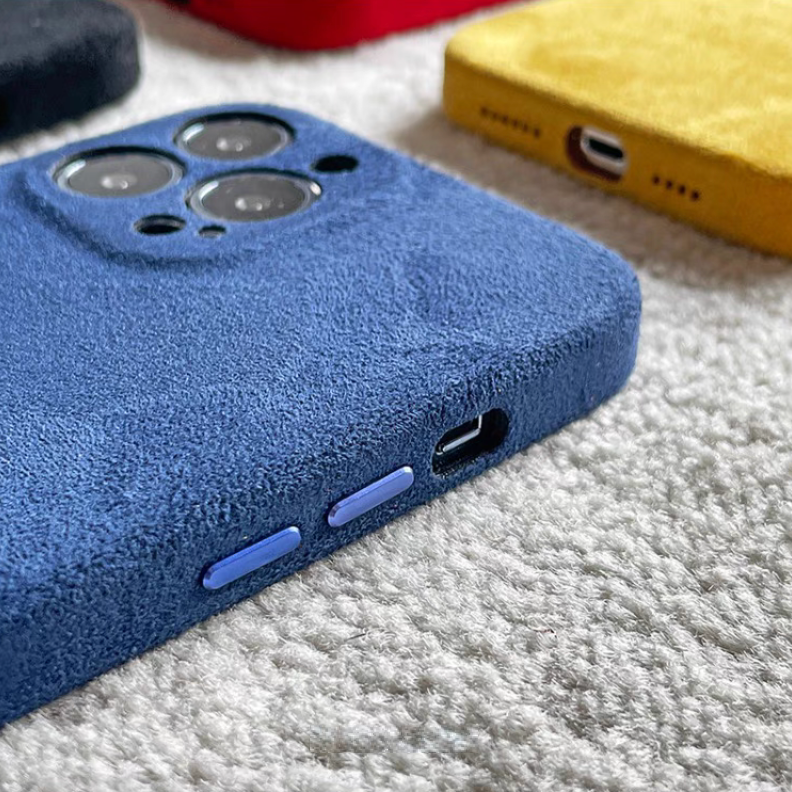 Royal blue microfiber suede phone case side view showing button controls and charging port access