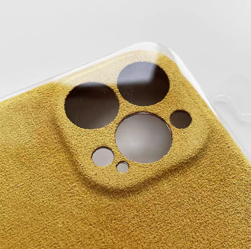 Yellow microfiber suede phone case camera cutout detail showing textured matte surface