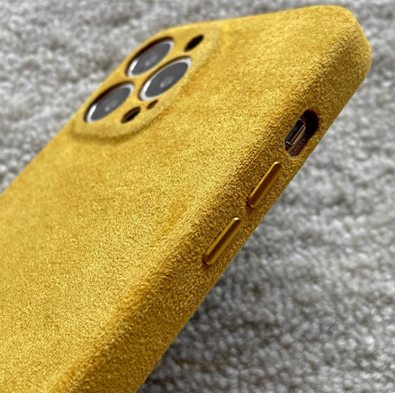 Yellow microfiber suede phone case side view showing button design and charging port access