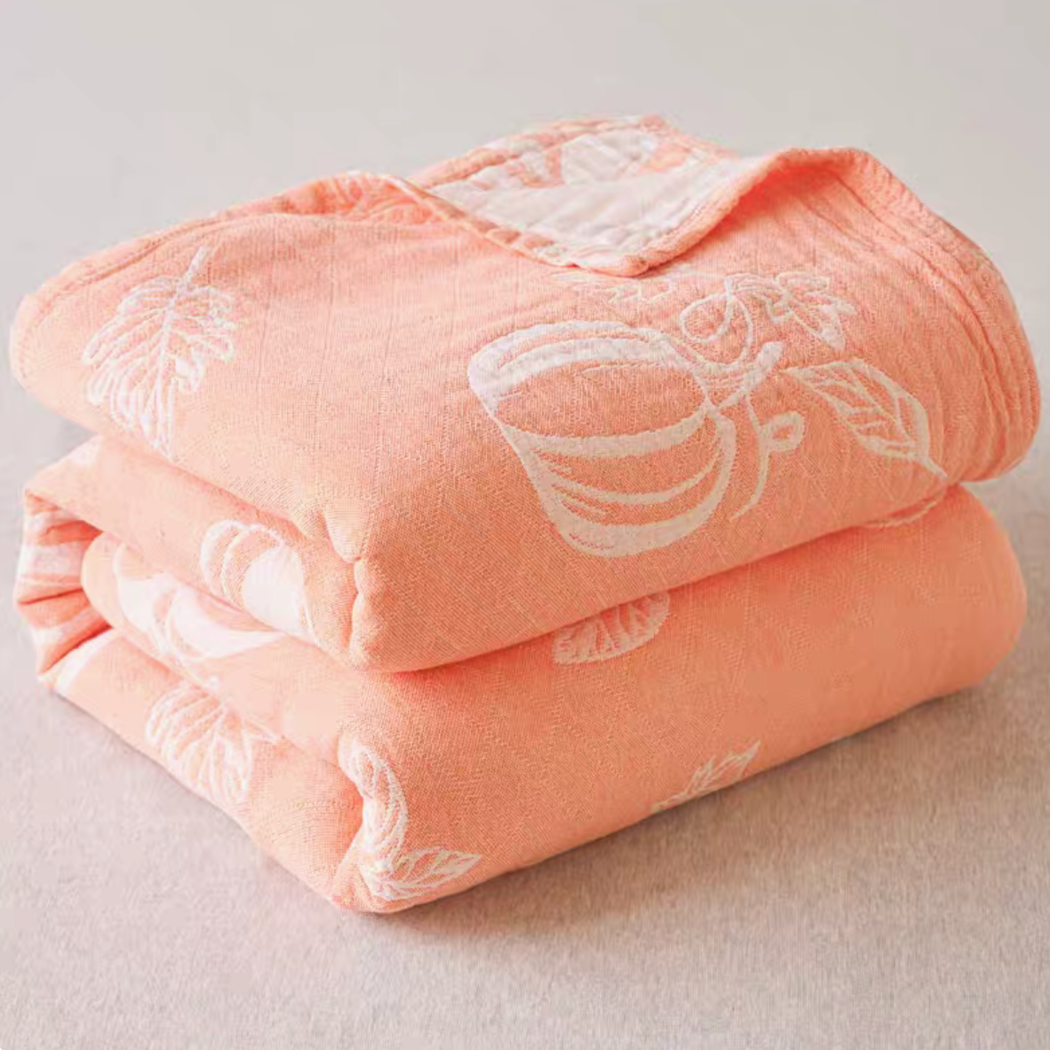Nature Cotton Quilt Orange Autumn Tale folded cotton jacquard quilt with autumn botanical pattern