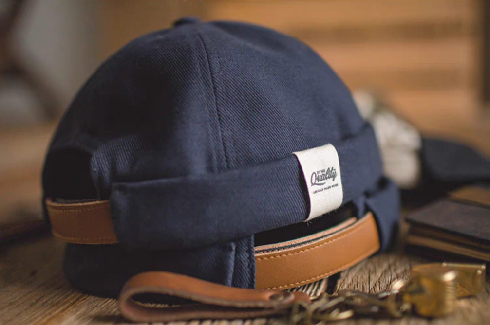 Dark Blue Nautical Miki Cap lifestyle side angle view highlighting cotton twill texture and rolled brim design