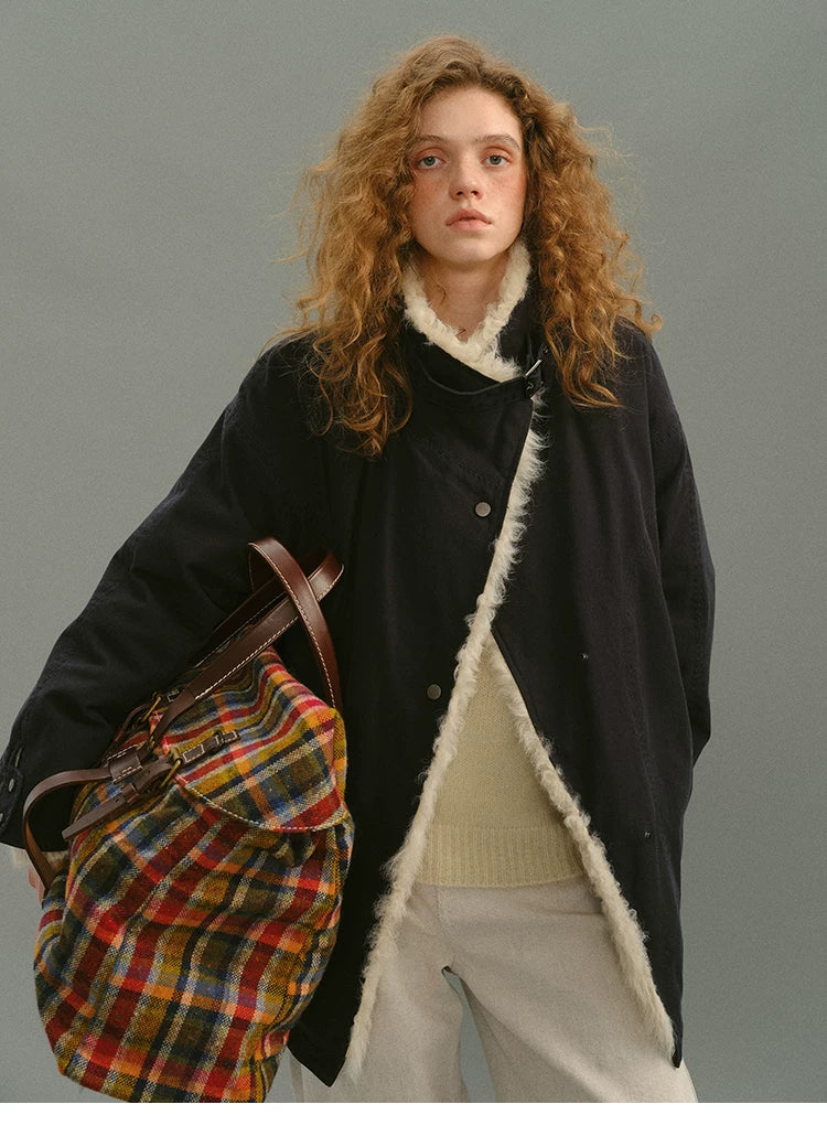 Navy cotton down parka with shearling-trimmed front edge and gunmetal snaps