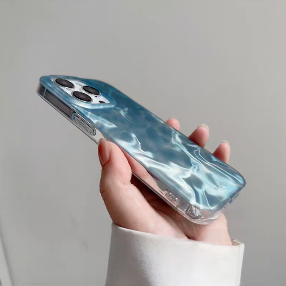 Ocean blue water ripple phone case angled side view with clear edges and slim protective fit