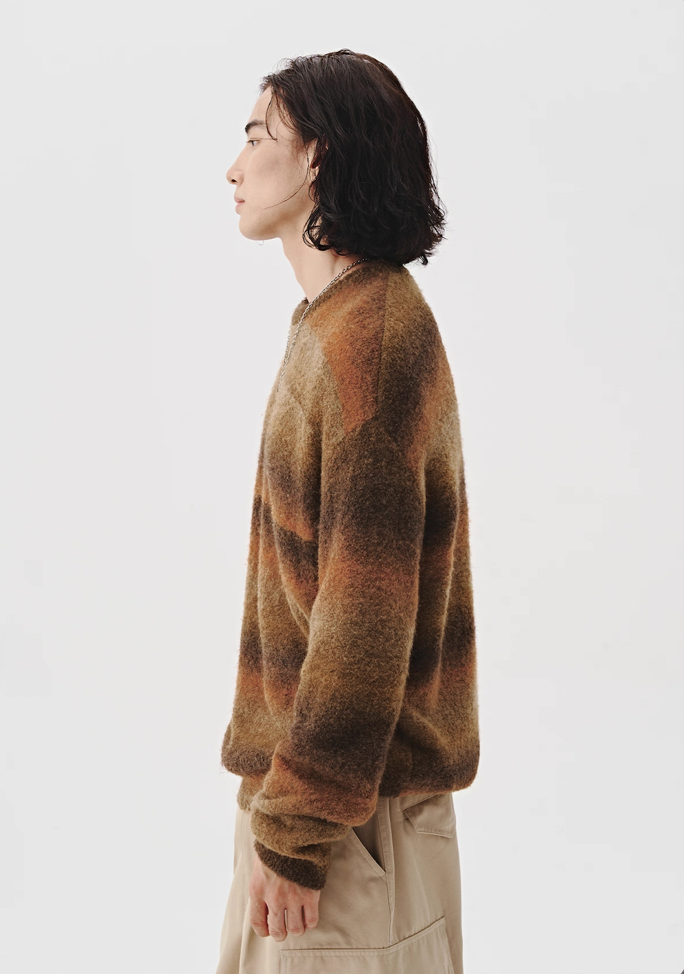 Side view of men’s gradient brushed knit sweater, relaxed silhouette.