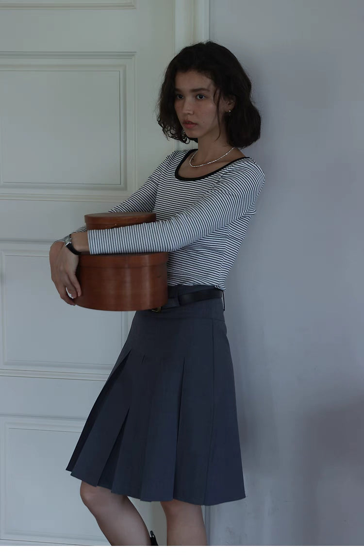 Pleated Chic Skirt gray high waist side view styled with striped top, highlighting tailored fit and structured pleats