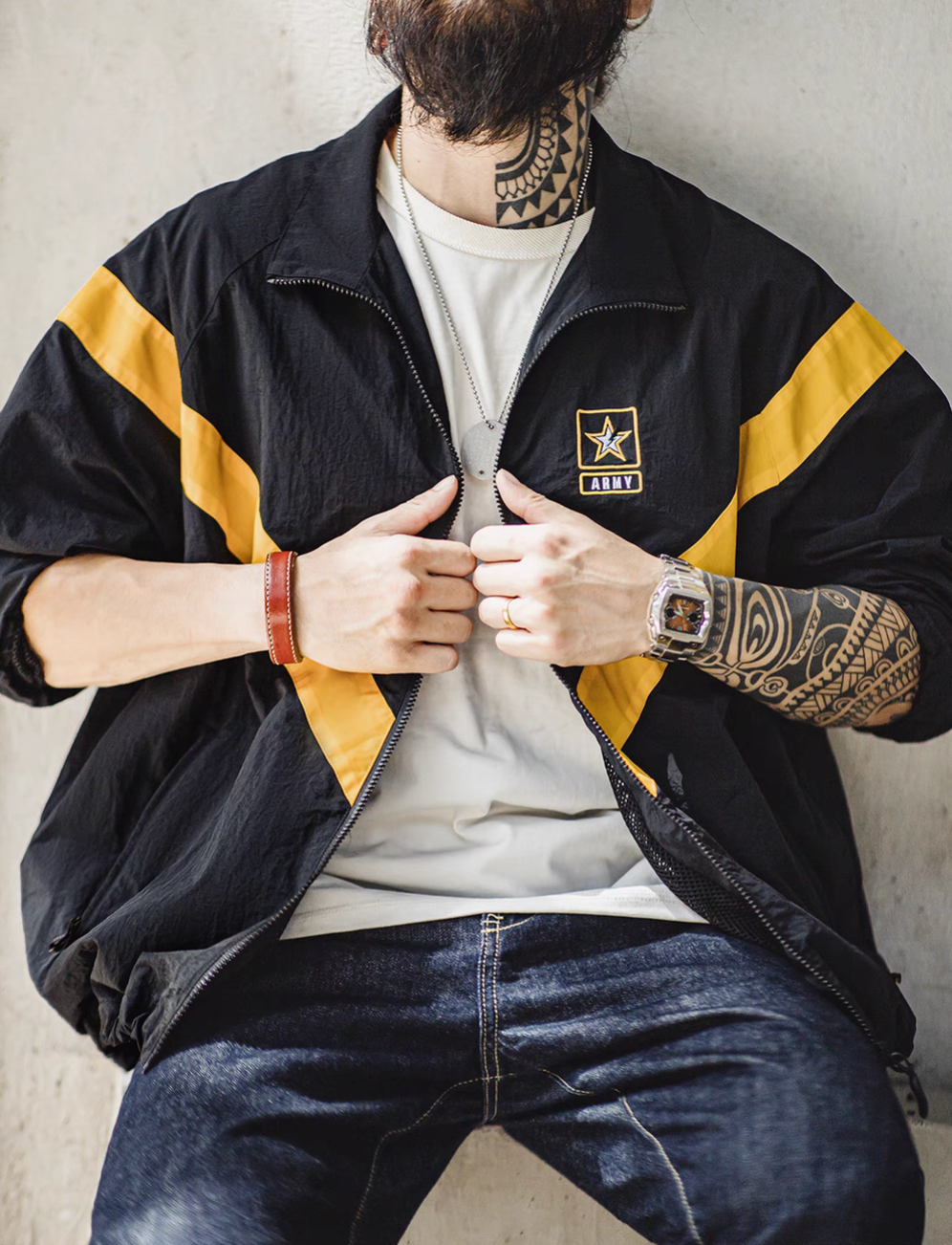 Black Reflective V-Stripe Tactical Zip Jacket worn open in a seated front view showing inner mesh lining and relaxed everyday styling