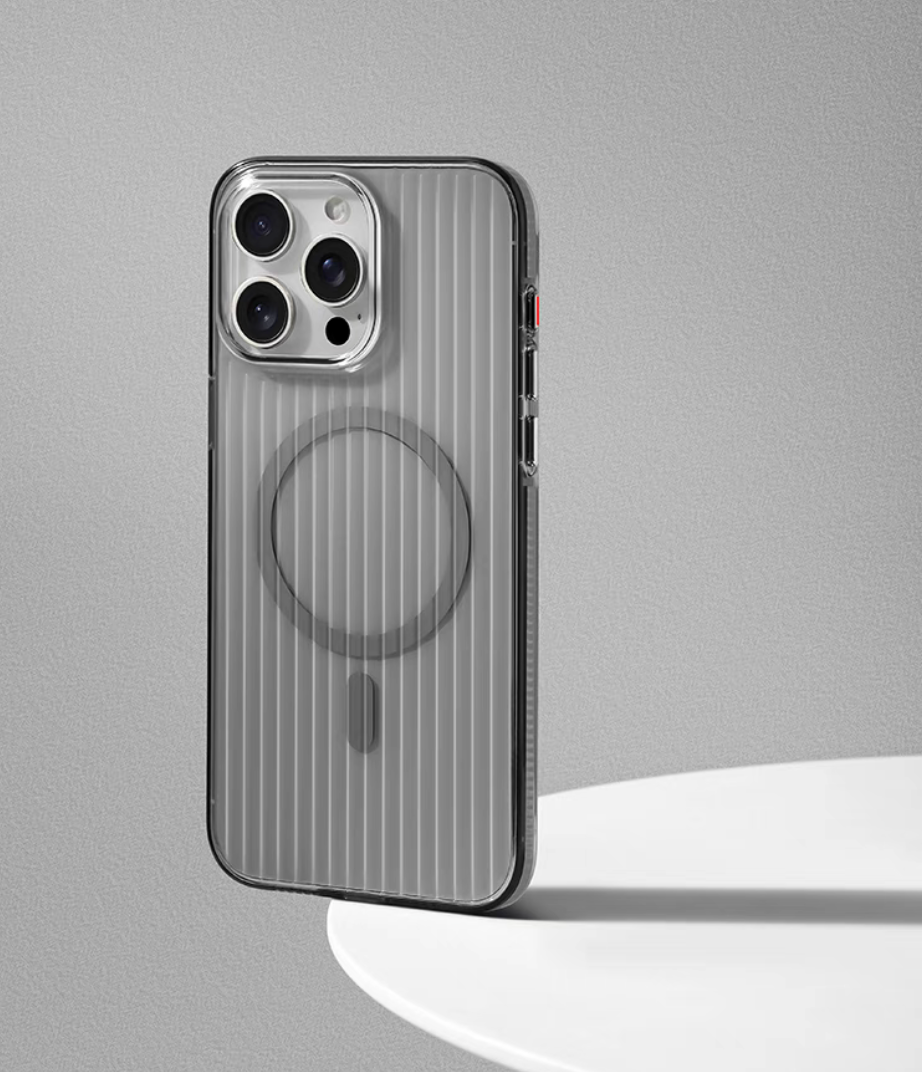 Gray ribbed magnetic phone case standing on curved platform showing subtle matte texture and reinforced corner protection